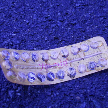photo of pill blister pack lying on wet road by Surija Sray on Flickr cc 2.0 attributiion